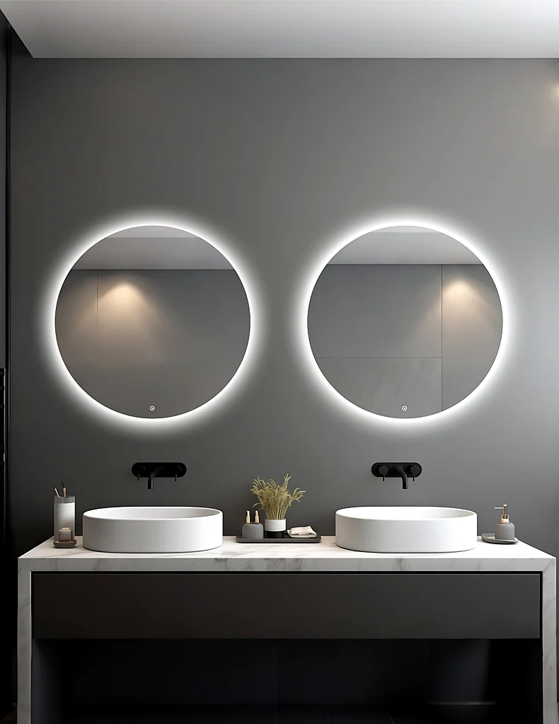 Corona round backlit LED mirror installed above bathroom vanity